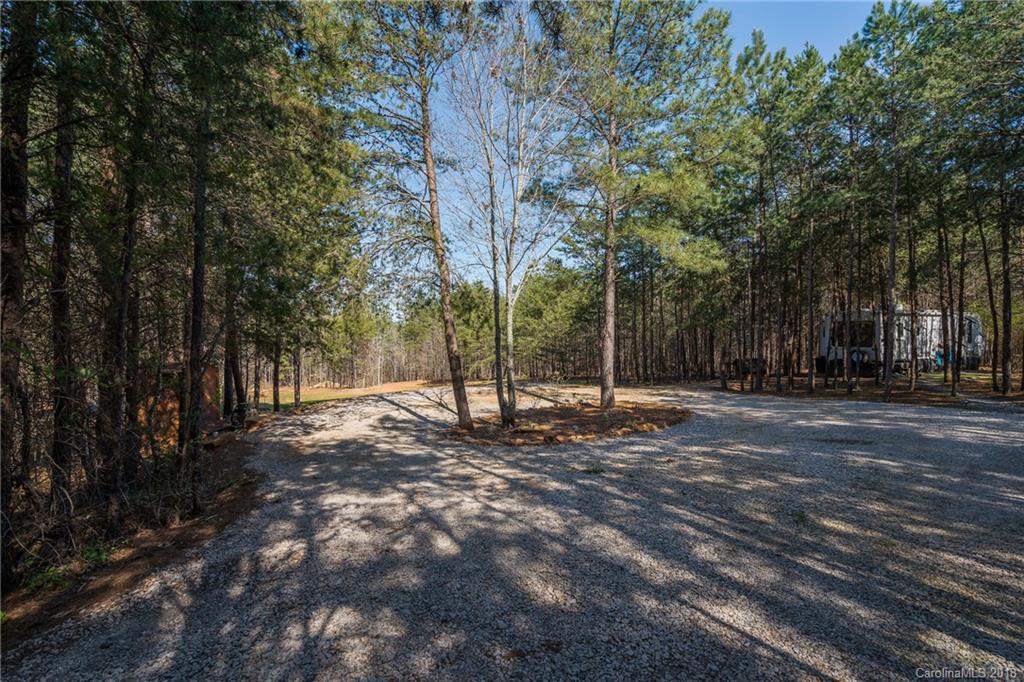 2702 Henry's Knob Road Clover, SC 29710 - Photo 1 of 21 a view of a tree with a yard