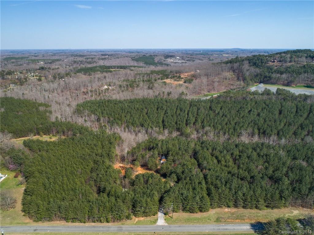 2702 Henry's Knob Road Clover, SC 29710 - Photo 15 of 21 a view of a lake with a mountain in the background