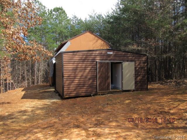 2702 Henry's Knob Road Clover, SC 29710 - Photo 17 of 21 a view of a house with a garage