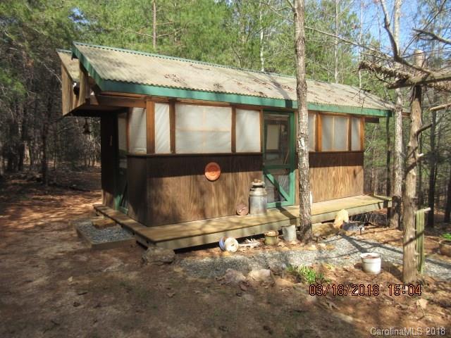 2702 Henry's Knob Road Clover, SC 29710 - Photo 18 of 21 a view of a house with backyard and sitting area