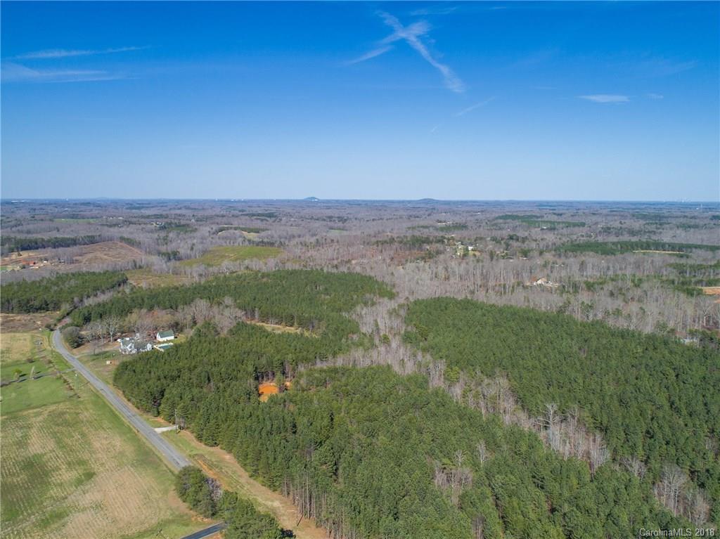 2702 Henry's Knob Road Clover, SC 29710 - Photo 10 of 21 a view of a lake with a city