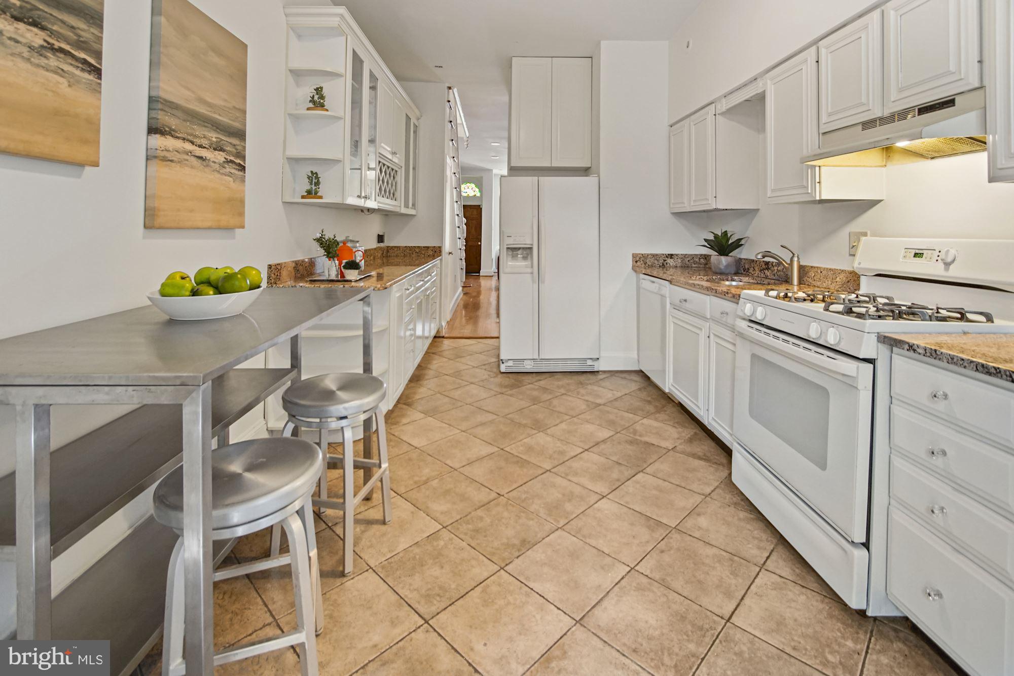321 F Street Northeast Washington, DC 20002 - Photo 9 of 30 Ample storage and counters surrounding a gas range