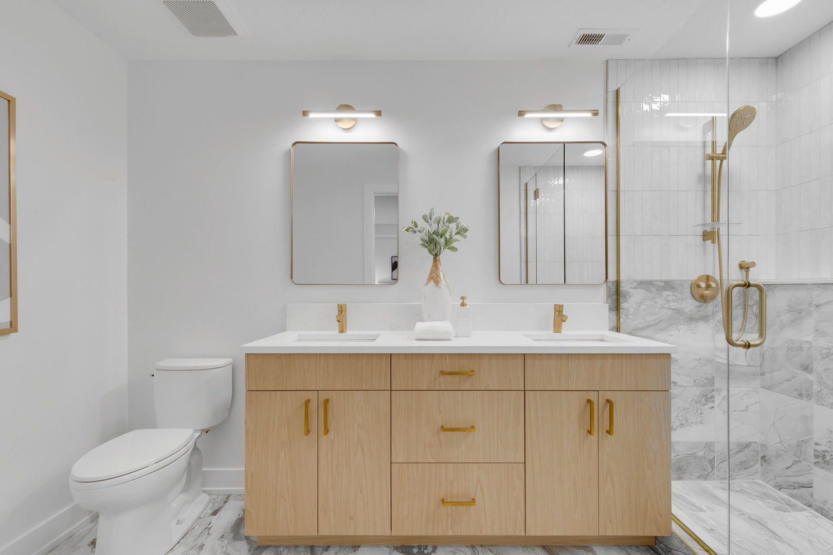 3204 North Kostner Avenue, Unit 506 Chicago, IL 60641 - Photo 15 of 23 a bathroom with a toilet sink and mirror