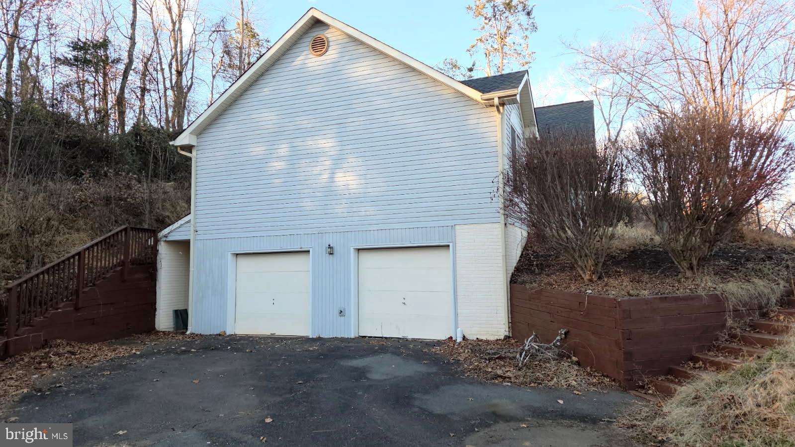 6233 Ridge Lane Warrenton, VA 20187 - Photo 2 of 2 a view of a house with a yard