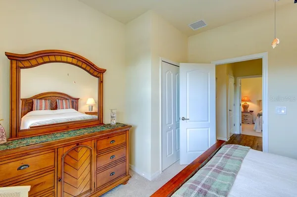 a bathroom with a sink toilet a mirror and shower