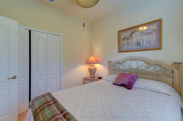 a view of a patio with a table chairs and a backyard