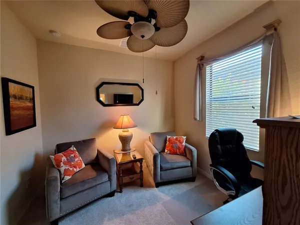 a view of a building with a yard