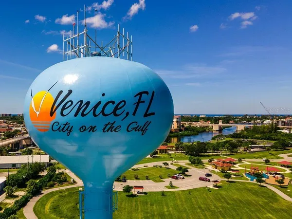 an aerial view of a houses with outdoor space