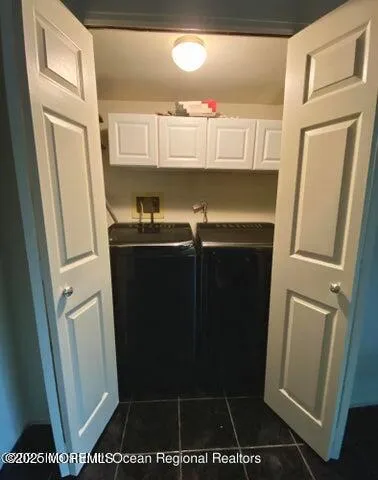 a bathroom with a sink a toilet a mirror and vanity