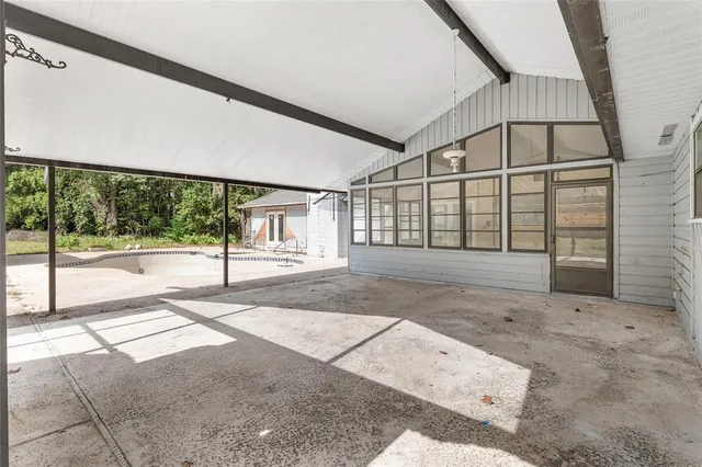 a view of swimming pool with a yard