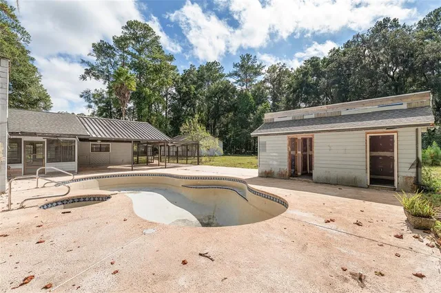 a view of a bathroom with a glass door shower