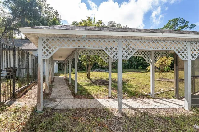 a house with trees in the background