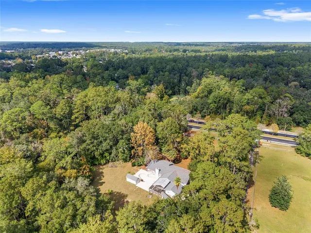 an aerial view of mountain with trees