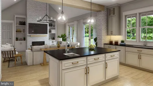 a kitchen with stainless steel appliances granite countertop a sink and a stove