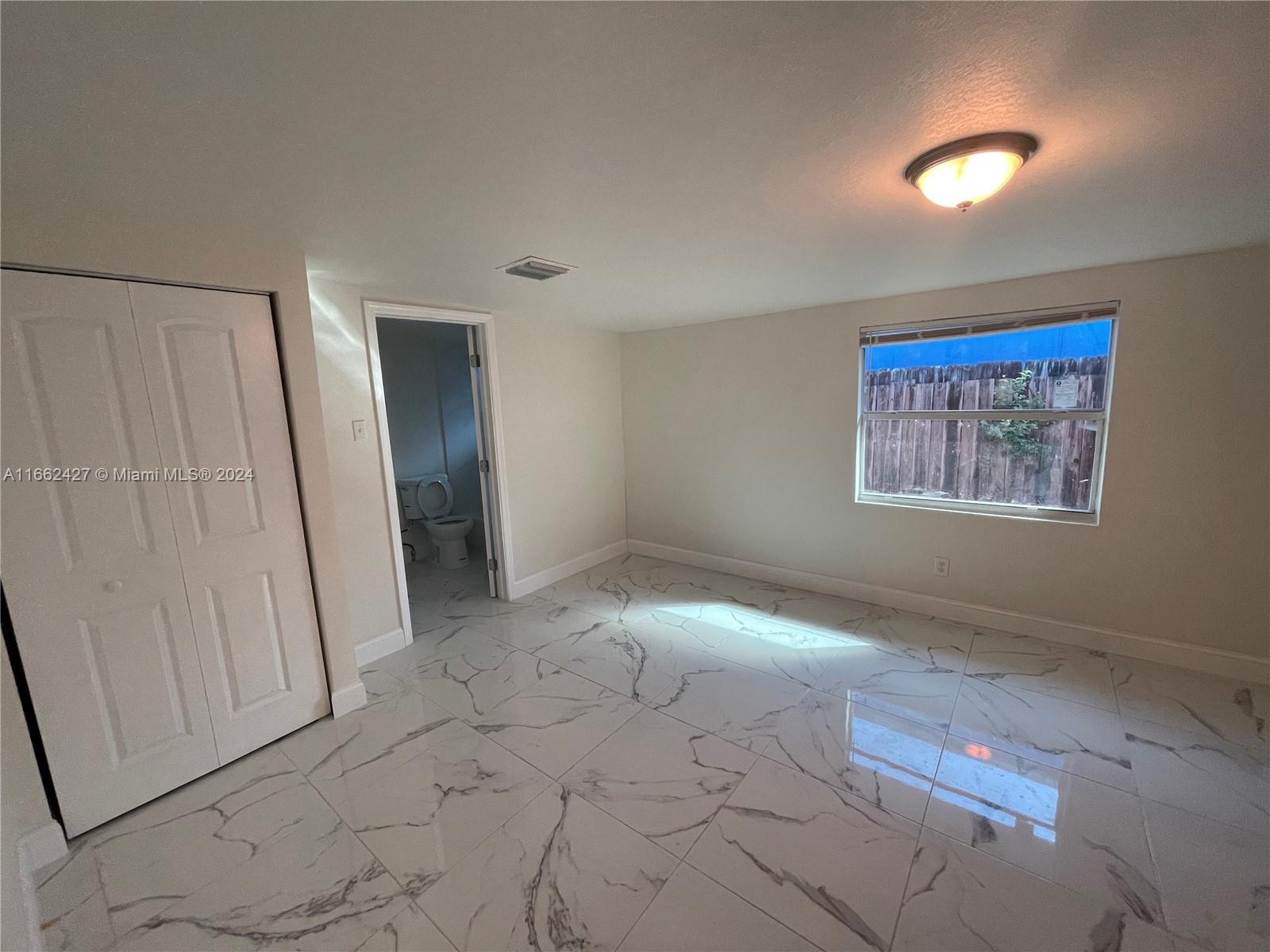 3327 Northwest 101st Street Miami, FL 33147 - Photo 2 of 6