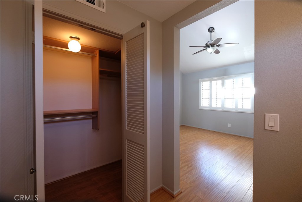 249 Alpine Street, Unit 57 Pasadena, CA 91106 - Photo 18 of 29 a view of empty room with wooden floor and fan