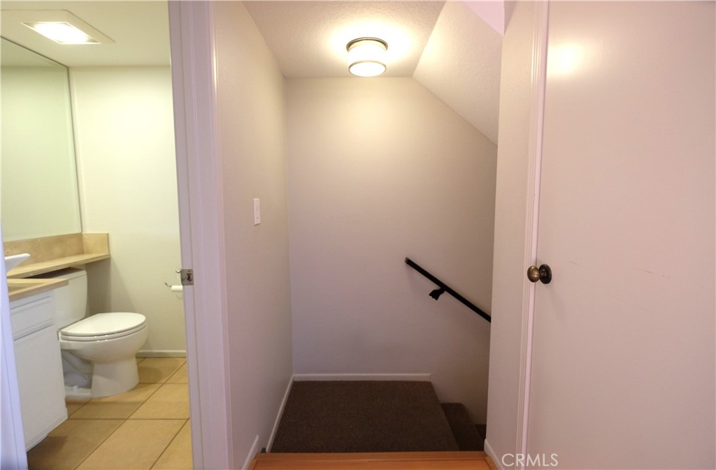 249 Alpine Street, Unit 57 Pasadena, CA 91106 - Photo 22 of 29 a bathroom with a toilet and a shower