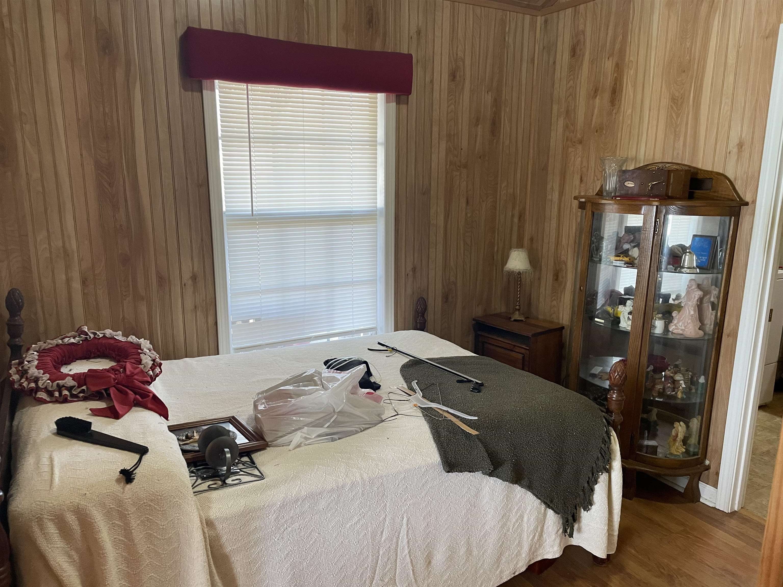 4130 Henderson Road Sardis, TN 38371 - Photo 4 of 14 a bedroom with a bed and a window