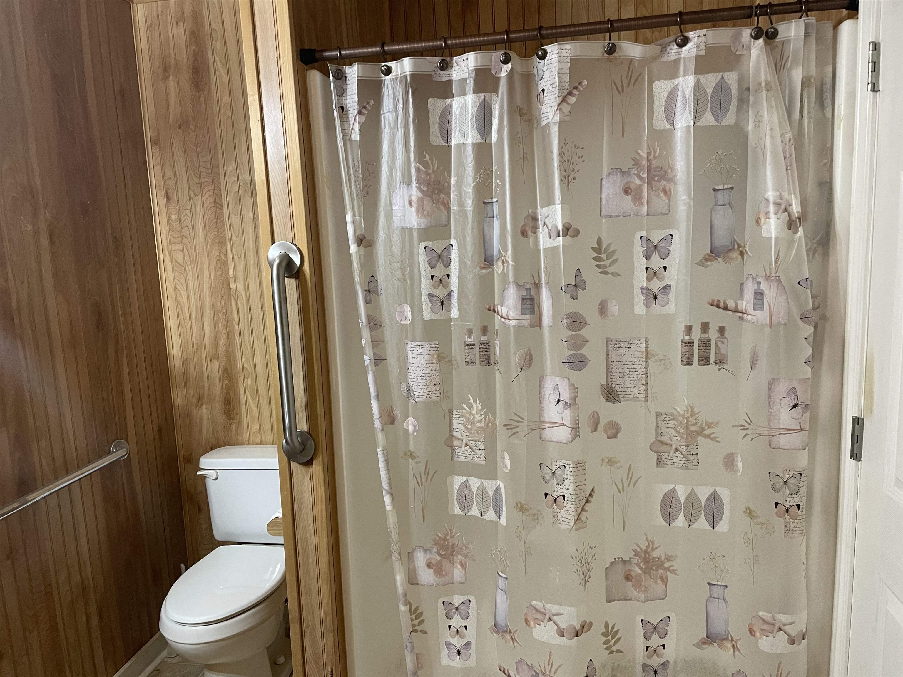 4130 Henderson Road Sardis, TN 38371 - Photo 6 of 14 a white toilet sitting next to a bathroom