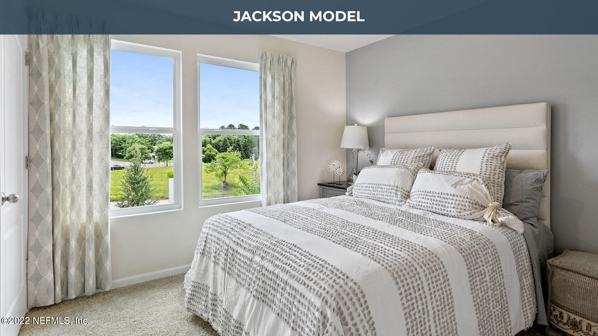 8312 Zenith Circle Jacksonville, FL 32256 - Photo 5 of 25 a bedroom with a bed and a window