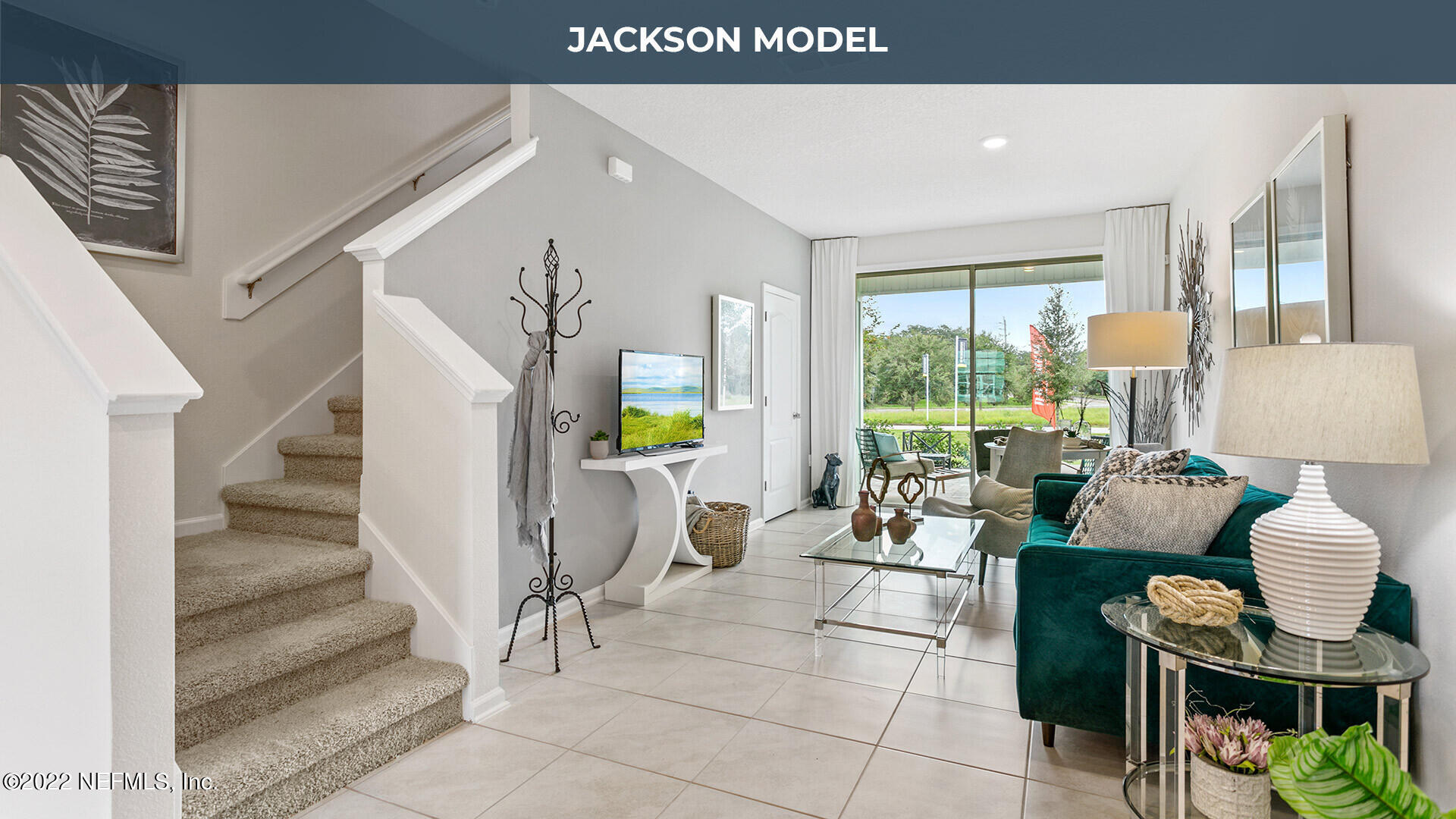 8312 Zenith Circle Jacksonville, FL 32256 - Photo 6 of 25 a living room with furniture and a floor to ceiling window