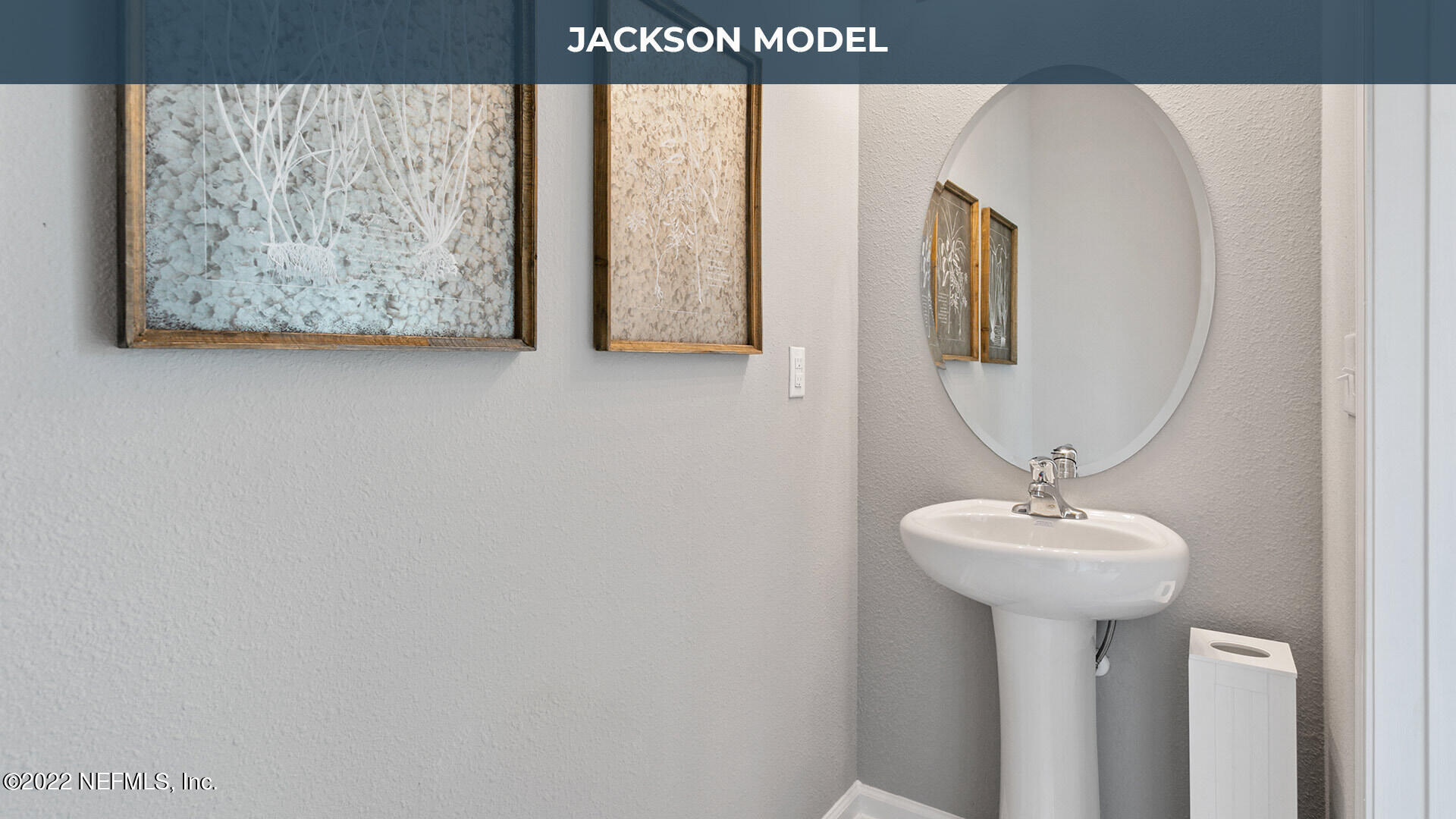 8312 Zenith Circle Jacksonville, FL 32256 - Photo 8 of 25 a bathroom with a sink and a mirror