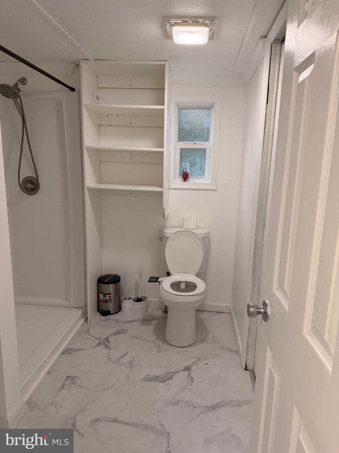 24 Carpenter Street, Unit 24 Dover, DE 19901 - Photo 6 of 27 Bright and airy bathroom retreat.