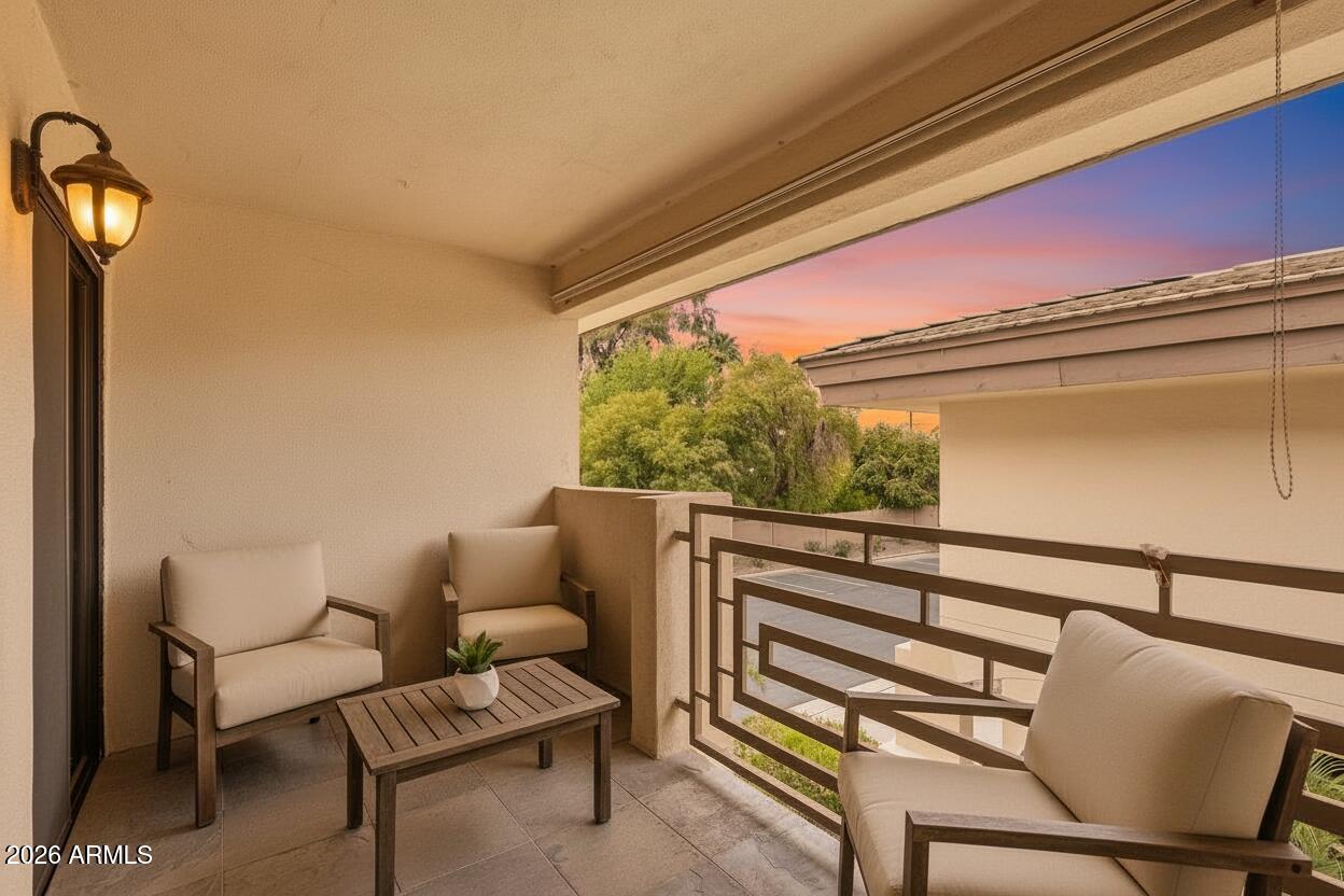 3235 East Camelback Road, Unit 211 Phoenix, AZ 85018 - Photo 14 of 17 a outdoor living space with furniture