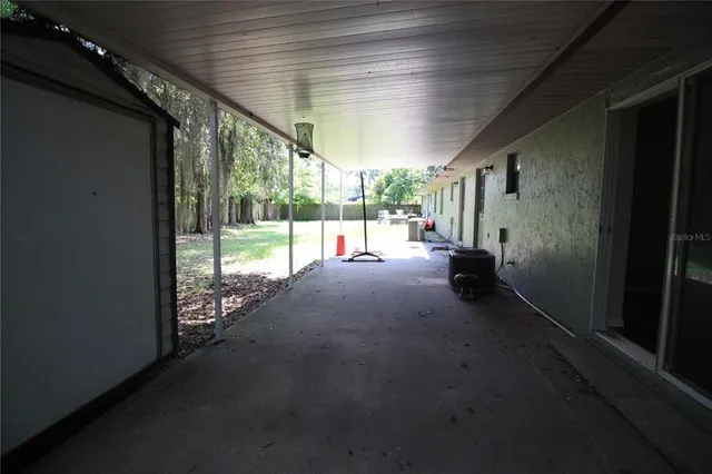a view of a porch with furniture