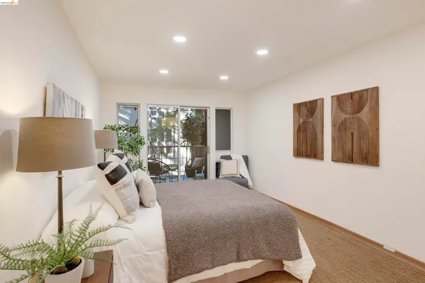 a bed room with a bed and a couch