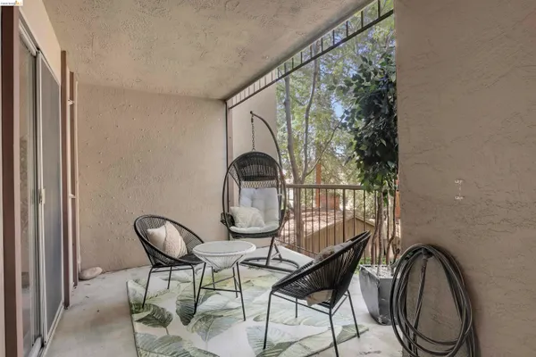 a view of a city from a corridor