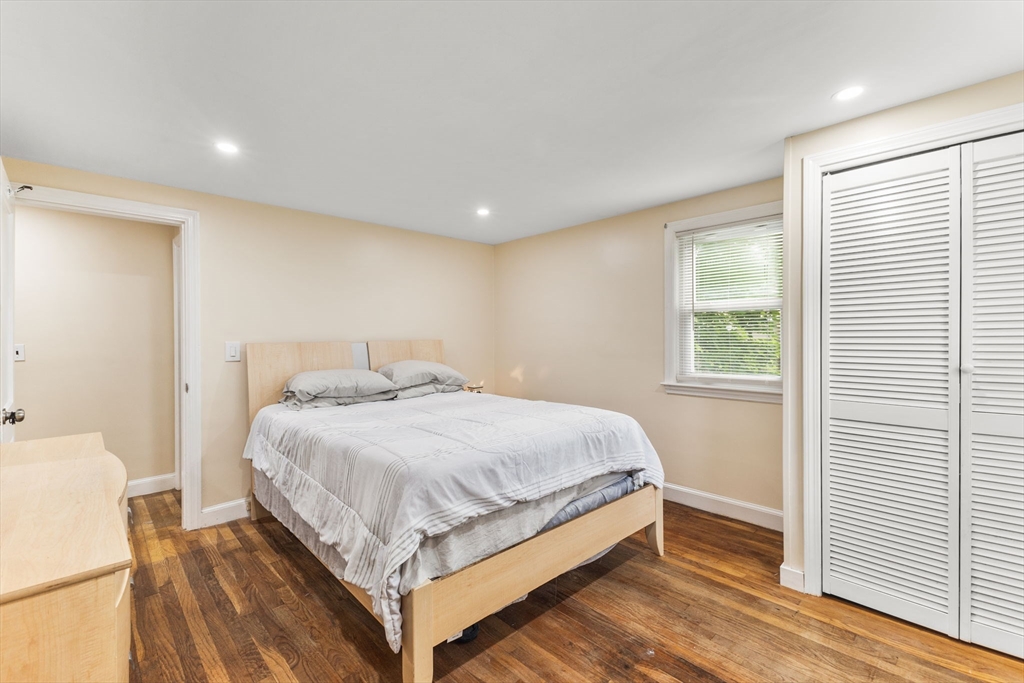 28 Maple Circle Randolph, MA 02368 - Photo 15 of 24 a bedroom with a bed and a window