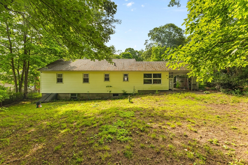 28 Maple Circle Randolph, MA 02368 - Photo 20 of 24 a view of a house with a yard