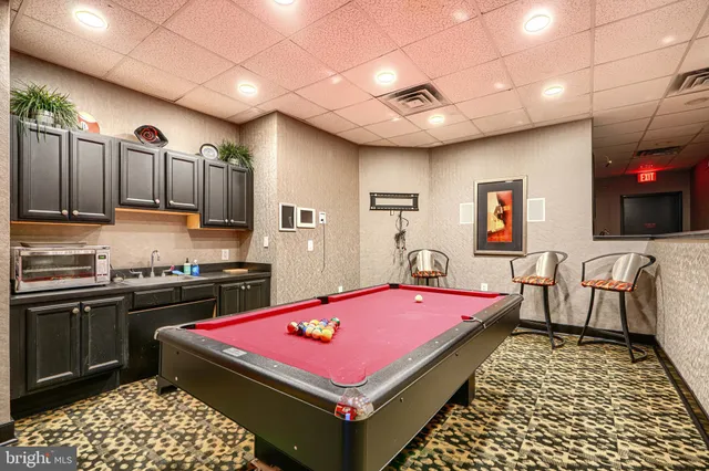 a very nice looking kitchen with a large window