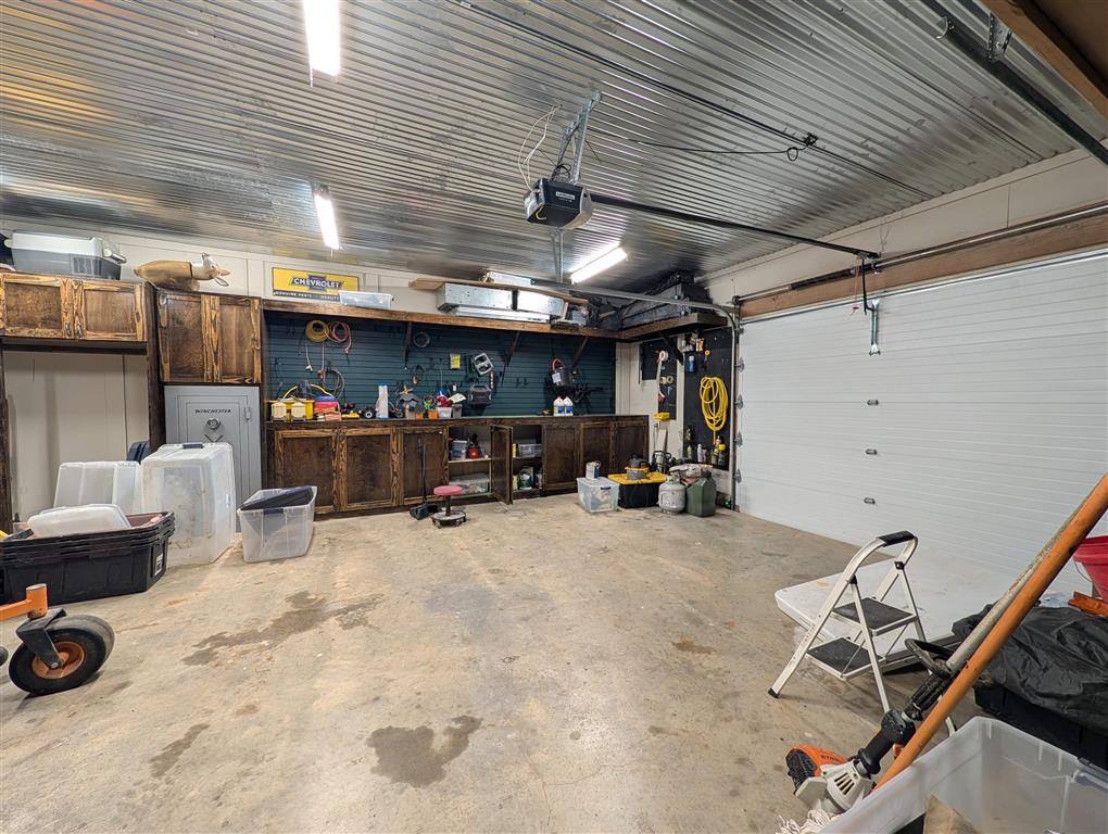 11480 Blanchard Road Welsh, LA 70591 - Photo 40 of 48 Insulated workshop (all walls and north roll up door included) can park additional vehicles