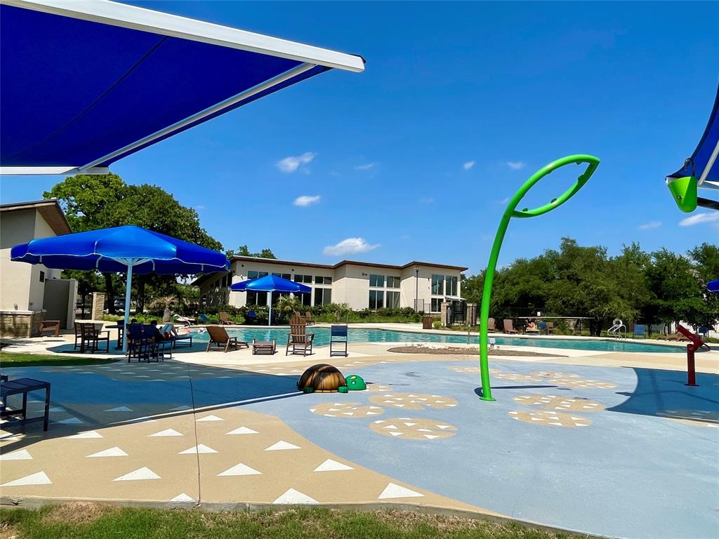 4420 Ingram Road Georgetown, TX 78628 - Photo 36 of 40 View of home's community with a pool and a patio area