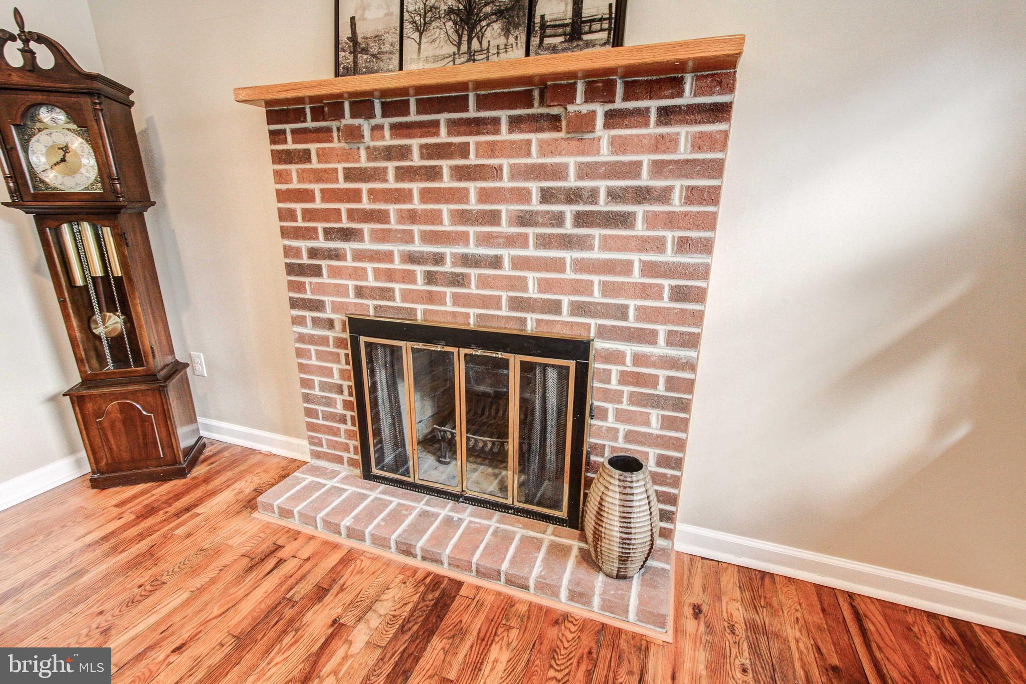 10 Latchstring Lane Hatboro, PA 19040 - Photo 12 of 32 Brick Wood Fireplace