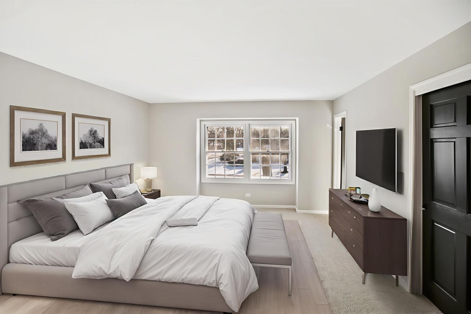 3451 Ithaca Road Olympia Fields, IL 60461 - Photo 13 of 30 a bedroom with a bed and a flat screen tv