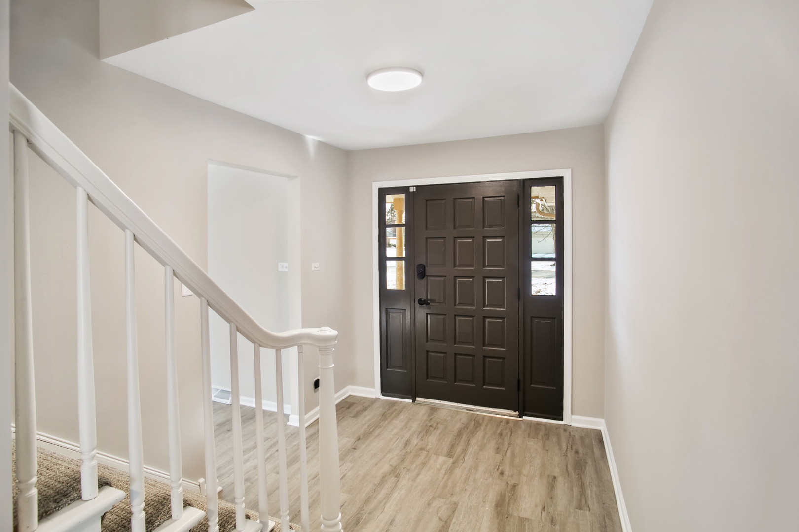 3451 Ithaca Road Olympia Fields, IL 60461 - Photo 2 of 30 a view of an entryway with wooden floor