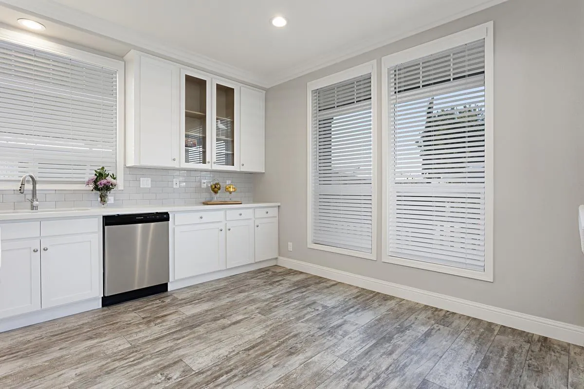 13335 Buena Vista Poway, CA 92064 - Photo 11 of 26 a view of a kitchen with wooden floor and windows