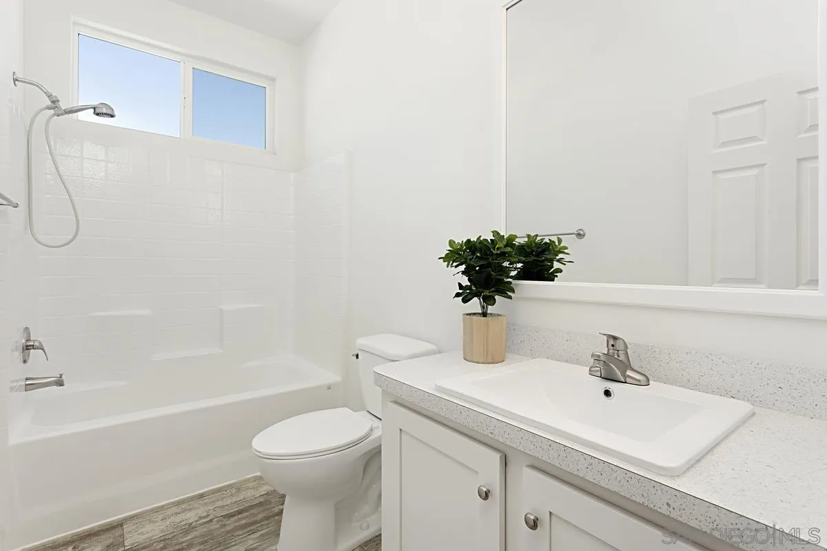 13335 Buena Vista Poway, CA 92064 - Photo 14 of 26 a bathroom with a sink a toilet and a bathtub