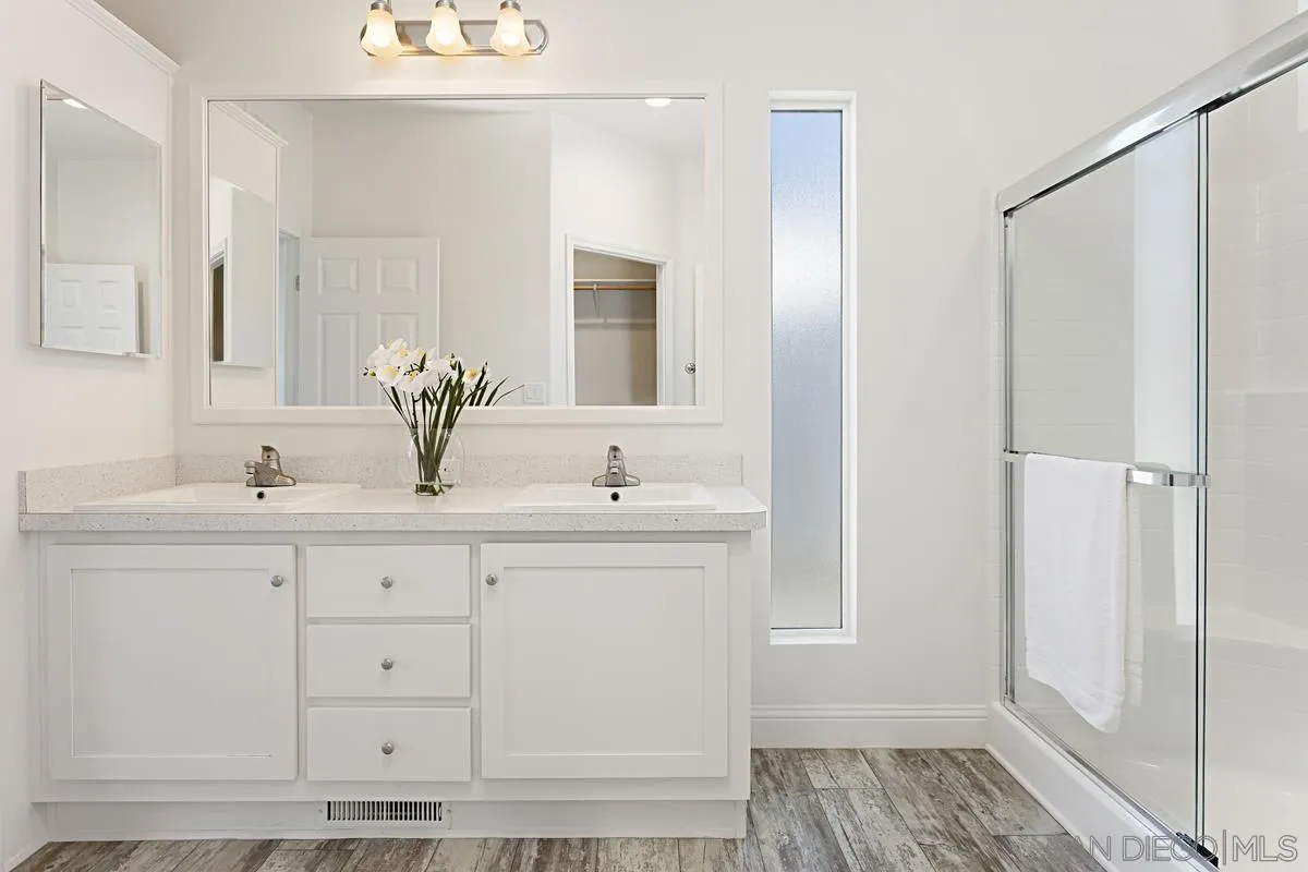 13335 Buena Vista Poway, CA 92064 - Photo 20 of 26 a bathroom with a sink and a mirror