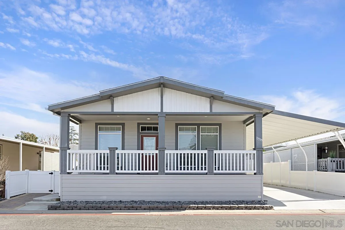 13335 Buena Vista Poway, CA 92064 - Photo 2 of 26 a view of a brick house with a yard