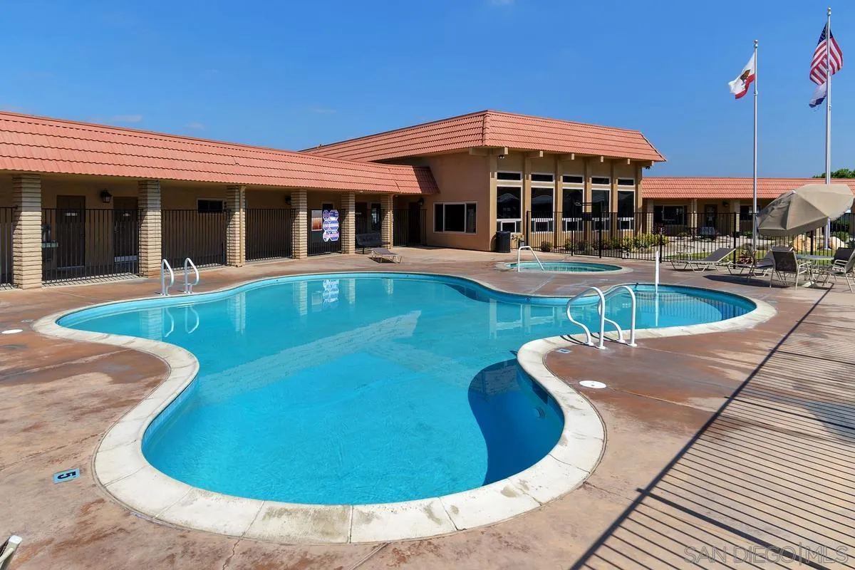13335 Buena Vista Poway, CA 92064 - Photo 22 of 26 front view of a house with swimming pool