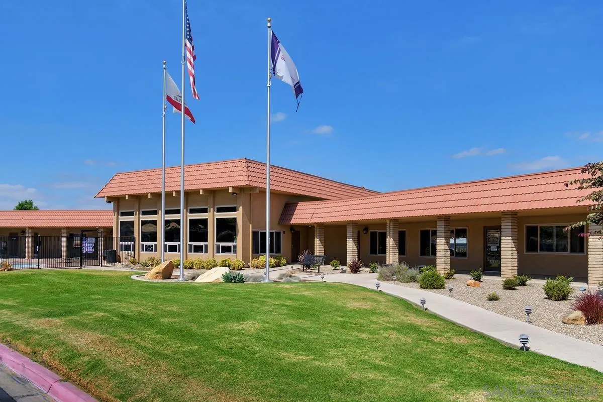 13335 Buena Vista Poway, CA 92064 - Photo 23 of 26 front view of a house with a yard table and chairs