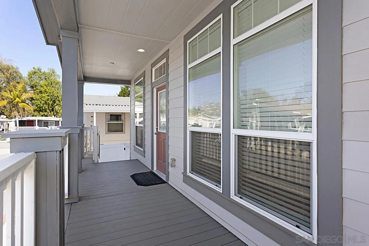 13335 Buena Vista Poway, CA 92064 - Photo 4 of 26 a view of a hallway with wooden floor and a fireplace