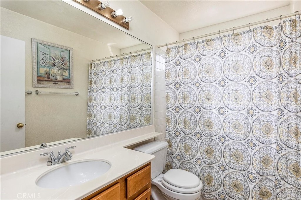 43115 Corte Landeros Temecula, CA 92592 - Photo 14 of 42 a bathroom with a sink toilet and shower