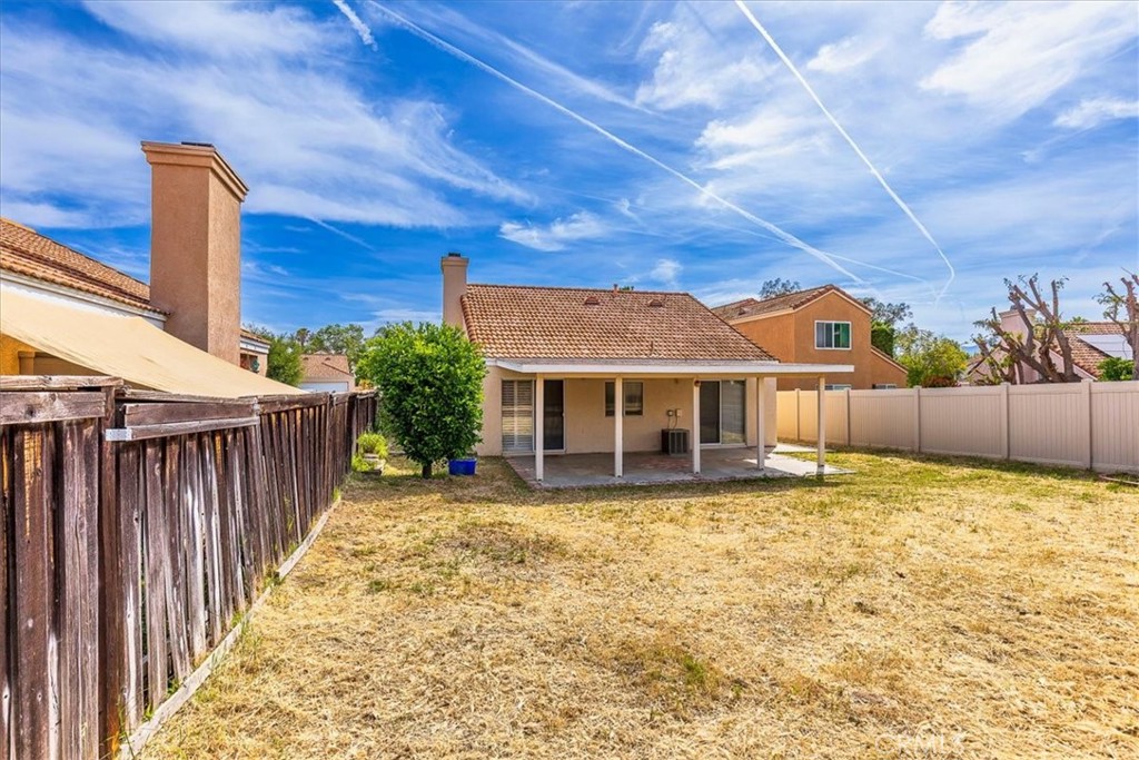 43115 Corte Landeros Temecula, CA 92592 - Photo 18 of 42 a view of a house with a yard