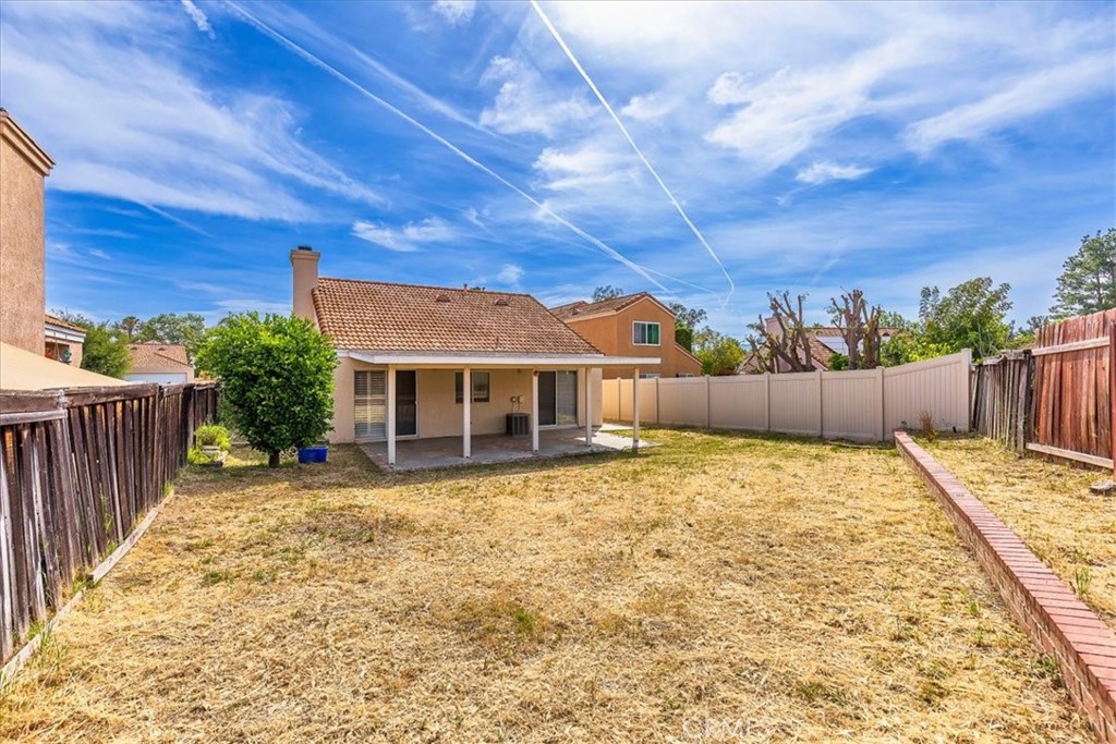 43115 Corte Landeros Temecula, CA 92592 - Photo 19 of 42 a view of a house with wooden fence