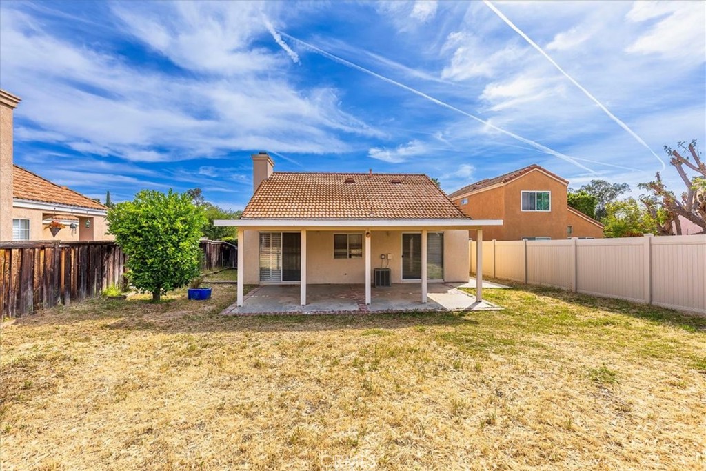 43115 Corte Landeros Temecula, CA 92592 - Photo 20 of 42 a front view of a house with a yard